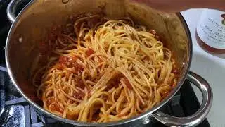 Making Homemade Linguini Dinner With Pasta From The Box and Sauce From The Jar.