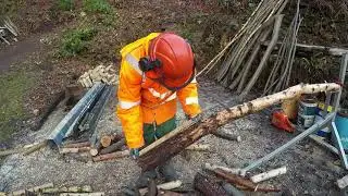 cutting logs with Husqvarna and log stand