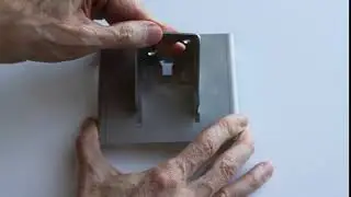 Fastening sheet metal:  Elastic flanges in mating part with hooks
