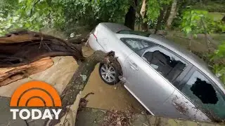 Search continues for 2 kids swept away in deadly Northeast floods