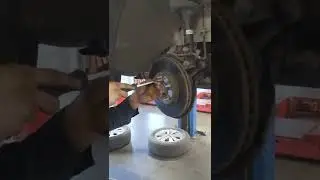 Removing Brake Rotor Screw 