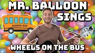 Mr. Balloon Sings The Wheels on the Bus with Acoustic Guitar