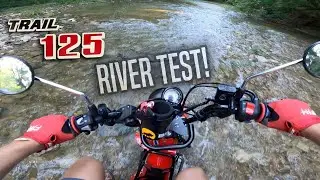 Riding my Honda Trail 125 into a river!
