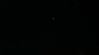 UFO/OVNI: Video N&deg;1 - Esfera luminosa flotando en el cielo y cambiando de color.