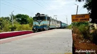 indiantrains@ superfast train action at karambele station near vapi/valsad gujarat, india