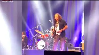 Johnny Depp Astonished On Stage By Gifts Thrown By His Fans In His Concert
