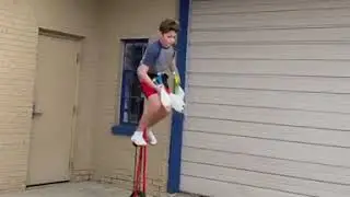 Boy Does Juggling With Five Pins While Riding Giraffe Unicycle - 1123720-3