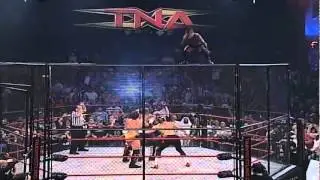TNA Chase Stevens shooting star press from the top of the cage.
