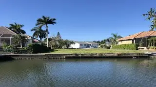 25 COVEWOOD, MARCO ISLAND, FL Presented by Robert Garranty.