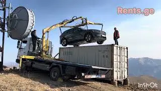 Volvo EX60 on top of a container in Gudauri Sky Georgia Rents.ge