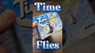 Flying clock toy