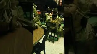 Soldier singing in the Library of Congress