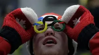 Olympic Fans Show Their National Spirit