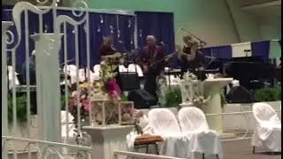 Larry Wilson & God's Country Band singing, 
