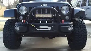 Smittybilt X20 Gen2 COMP 10k winch pulling out large bushes