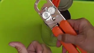Left-handed Orange Handled Can Opener Only from Lefty's the Left Hand Store