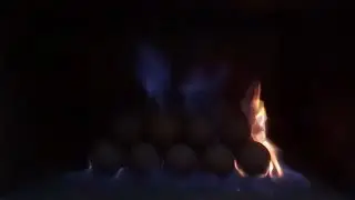 Fireballs installation in a fully vented, natural gas fireplace