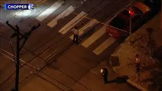 Gunman at large after firing shots at police officers