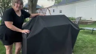 Looking at the Unicook Grill Cover 70 Inch, Heavy Duty Waterproof Gas Grill Cover for Outdoor Grill