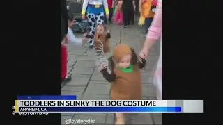 Toddlers in Slinky the Dog costume