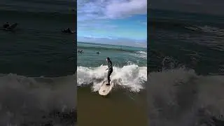 Black and Blue Wetsuit on a Good Ride out in Pacific Beach San Diego 01/09/26