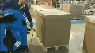 Remove the strapping tool on JD-008 PALLET STRAPPING SYSTEM to do pallet strapping