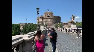 Crossing the St. Angelo Bridge in Rome, Italy