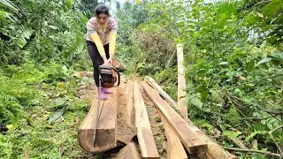Linh went into the garden to cut wood to replace the old stove that had been destroyed by termites.