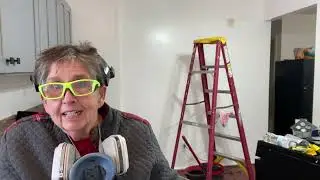 Sanding kitchen countertop and backsplash