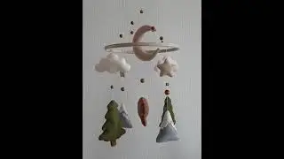 Baby mobile with bear, moon, stars, trees and mountains; woodland nursery decor
