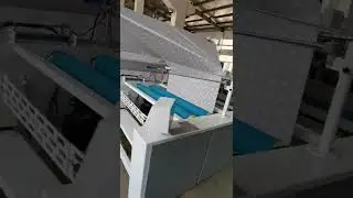 Automatic doubling fabric folding machine