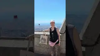 Climbing up to Tibidabo, Barcelona and down to town on the Funicular train