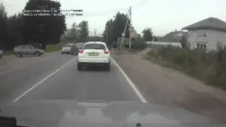 Angry Russian Guy Smahes Cellphone in Road Rage
