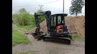 Eurocomach 65TR/ pohled z kabiny/ převoz panelů
