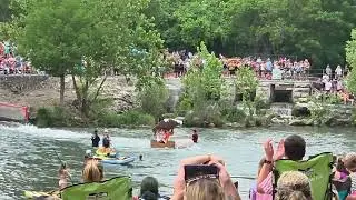 Flintstones stay upright at the Thru The Chute Cardboard Boat Race in New Braunfels, Tx