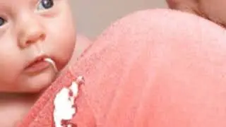 How to reduce milk spitting up in infants