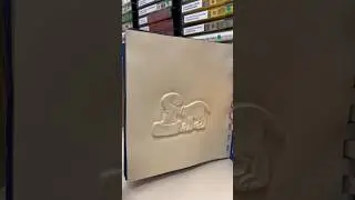 Vintage, Snoopy book with raised line drawings and braille.