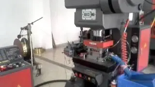 High speed CNC press with twin servo feed and decoiler