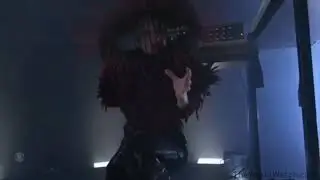 Satanist Lady Gaga Lady took the Grammys stage dressed as a caged bird wrapped in red feathers durin