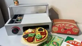 Melissa & Doug Top & Bake Wooden Pizza Counter Play Set with Play Food Review