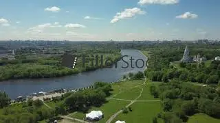 Flying over a green suburb