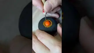 Beautiful ORANGE dot mandala stone! #dotpainting #mandalaart @SturnioloTriplets #art #dotart