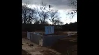 Superior Walls foundation panels being set...