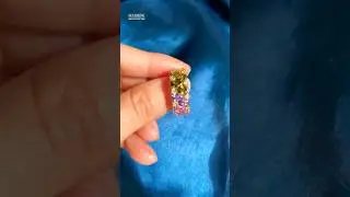 Sayabling 12ctw Pear Cut Multicolor Sapphire Rainbow Eternity Ring