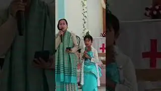 mom and daughter singing for the glory of God.