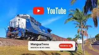 Locomotivas Dash-9 liderando uma composição vazia e formação Locotrol de Dash-9. 