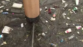 Step-by-step look at cleaning up trash clogged in and around Buffalo Bayou