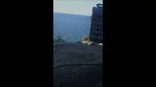 Tim Morelli On The Cliff / PO-35 speak