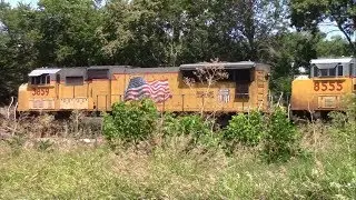 Union Pacific mixed freight passes North 4th Street, Ames, Iowa