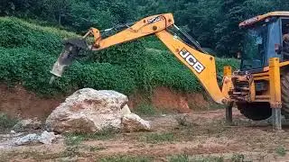 backhoe loder vs Big stone 3dx jcb  Super breaker.............